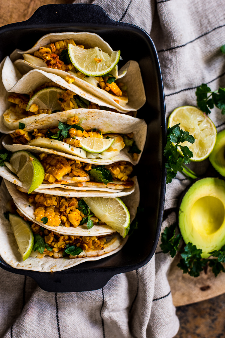 Soft tacos with halloumi, guacamole and grilled corn